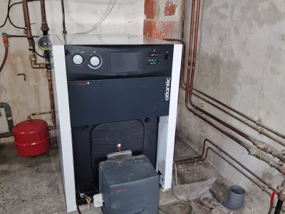 Système de chauffage avec pompe à chaleur et réservoir